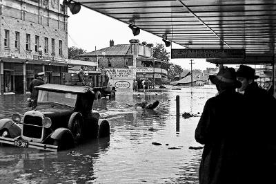 Flood damage in High Street, Maitland's main  street 1955