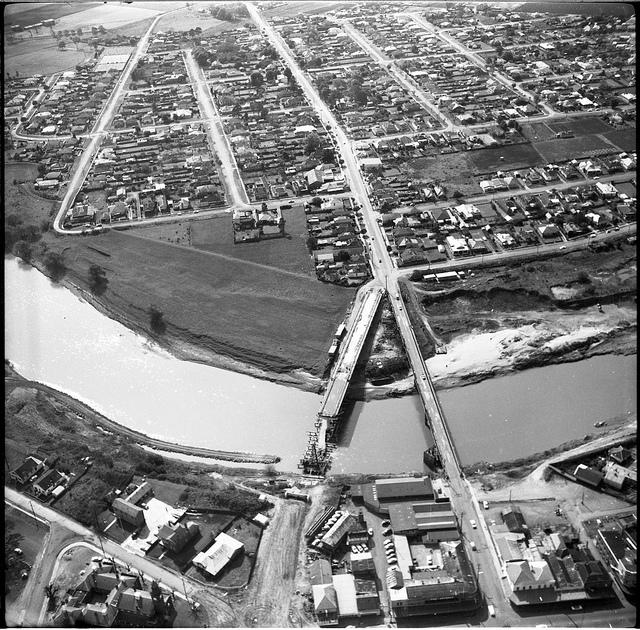 New and Old Belmore Bridge from the air, Maitland, 1963